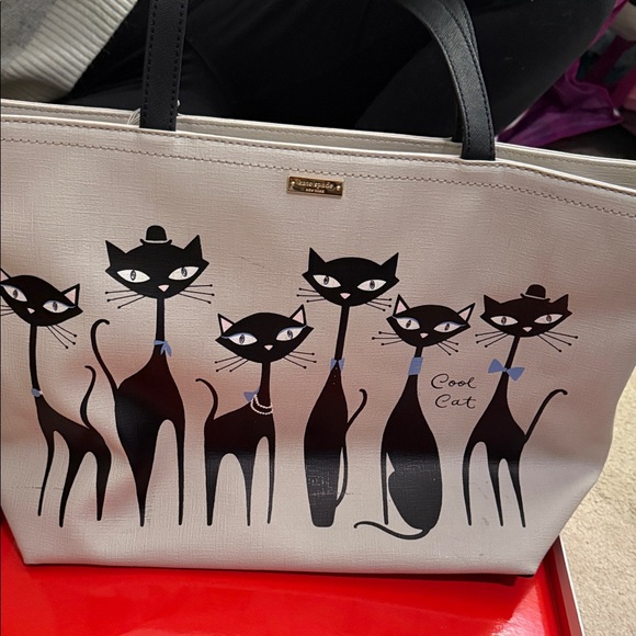 kate spade Handbags - Kate Spade Black and Cream Cat Print Shoulder Bag